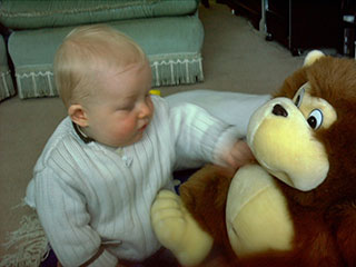 David with a stuffed gorilla.