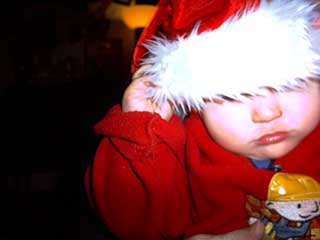 Little man in santa hat Little man in santa hat.